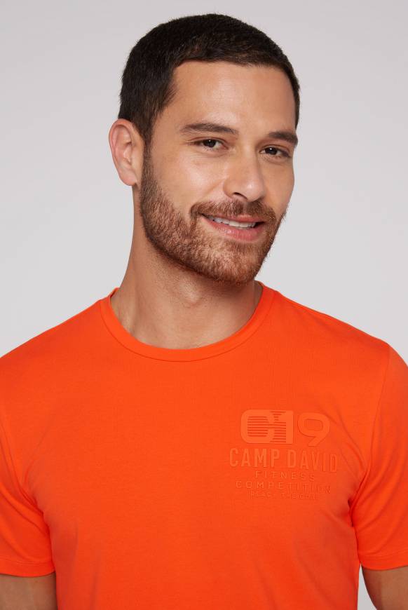 Soccx Sport-T-Shirt mit Artwork signal orange Fabrikladen