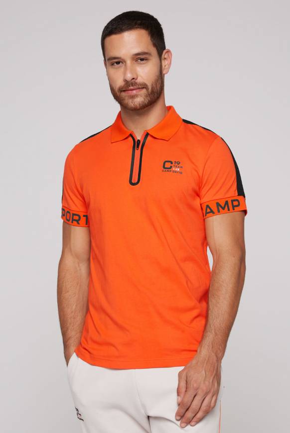 Soccx Poloshirt mit Zipper und kontrastvollen Prints signal orange zollfrei
